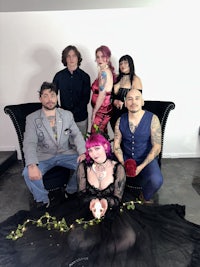 a group of people posing for a photo